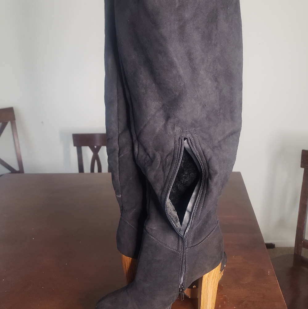 Knee high black heel boots